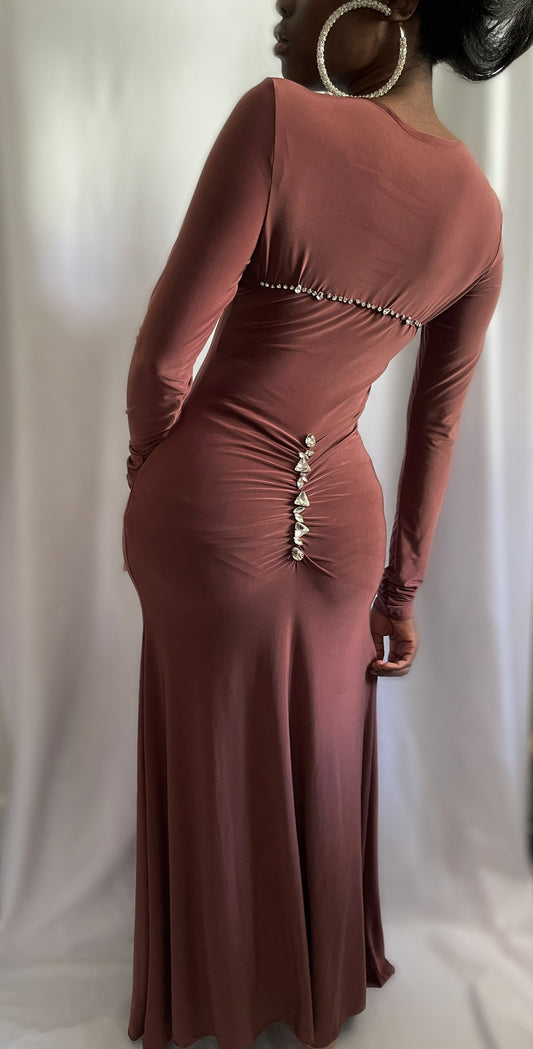 Back view of dress. Dress features sparkling rhinestones down center back, and across shoulder width.